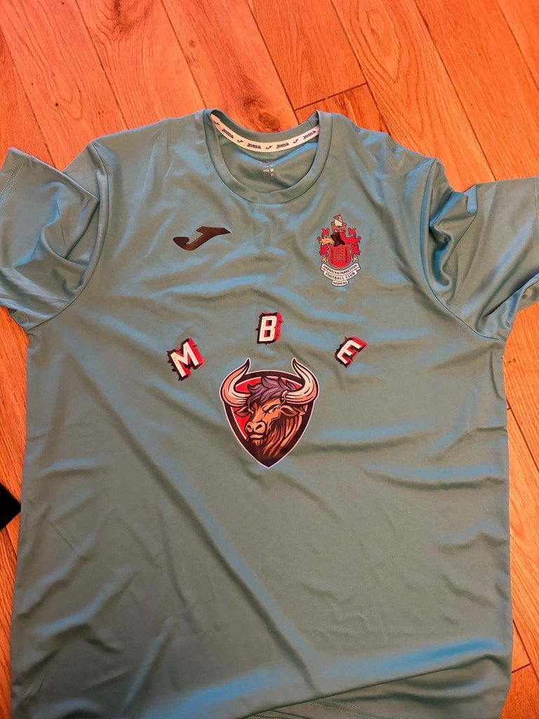 Light blue MBE Minicabs shirt with the Harwich and Parkeston Football Club crest